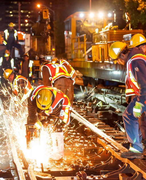 TTC crews cut subway tracks during maintenance work.