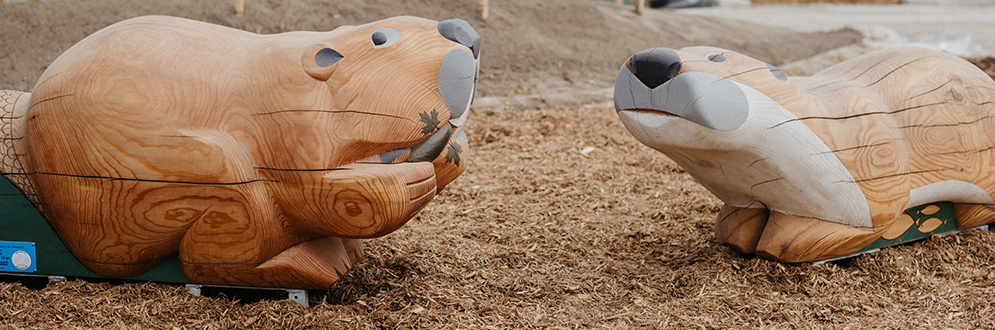 Beaver and otter dodem animals carved from wood.