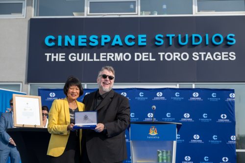Mayor Chow and Guillermo del Toro with the Key, in front of the Guillermo del Toro Studios