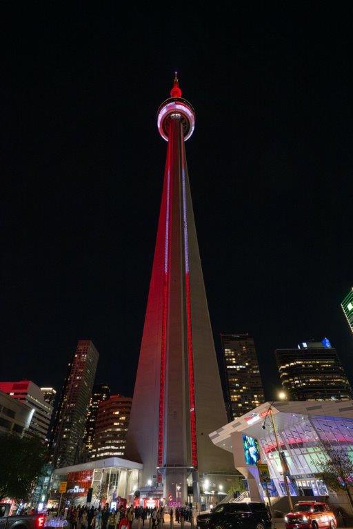 CN Tower at night lit up red and white