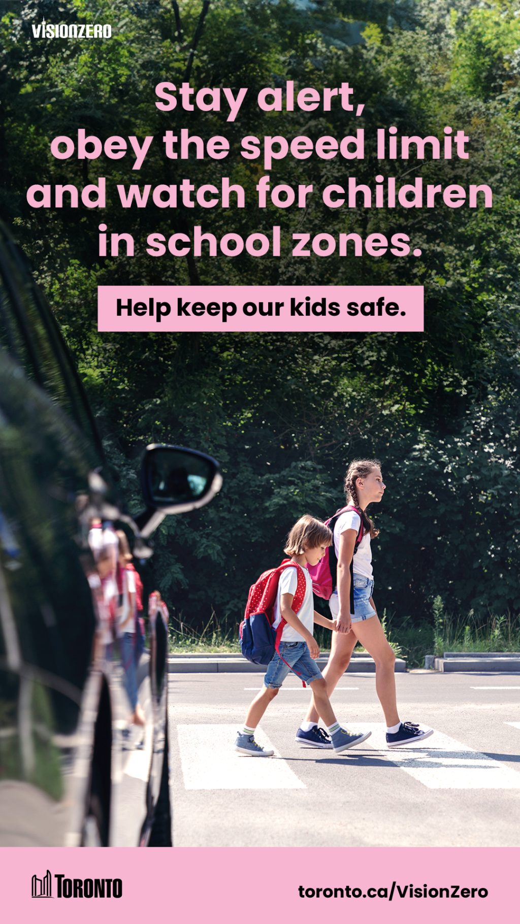 Two children crossing the street with backpacks on infront of a car.