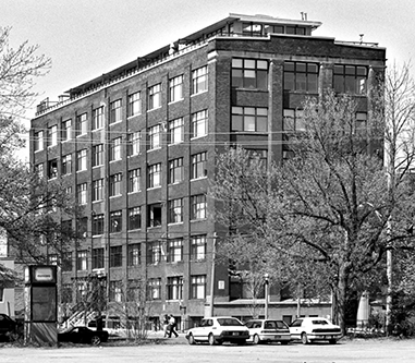 A mid-rise brick office building.