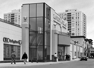 The exterior of Bayview Village shopping centre with tall residential buildings in the background.