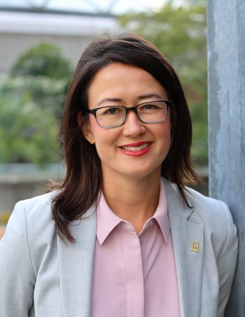 A headshot of Dr. Michelle Murti in professional attire