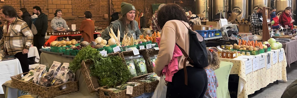 People shopping at an indoor market.