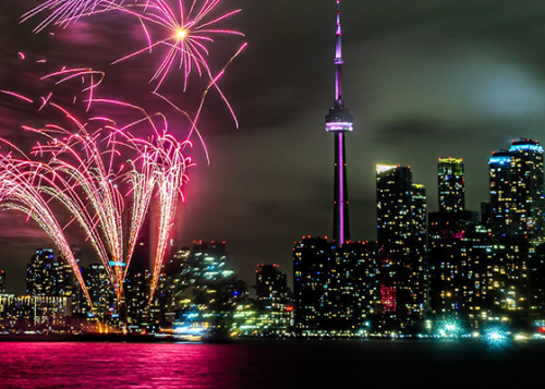 Fireworks in front of Toronto harbour and skyline