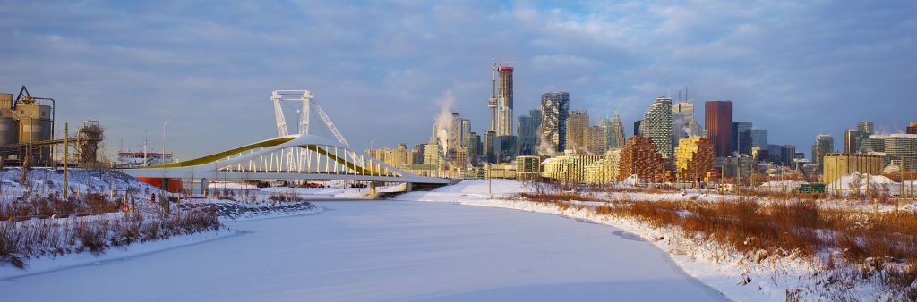Biidaasige Park at sunrise with the city skyline in the background