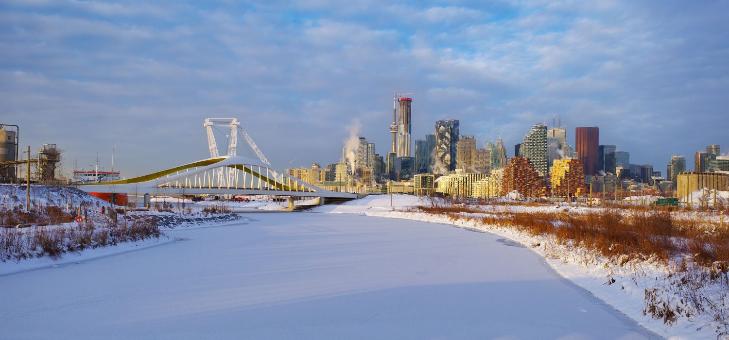 Biidaasige Park at sunrise with the city skyline in the background