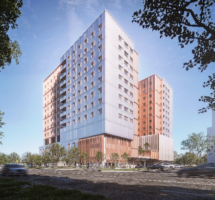 Exterior view of a modern multi‑storey building at 4610 Finch Avenue East, shown from street level with trees and landscaping in the foreground.