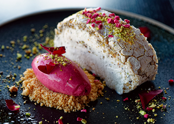 Two plated meringue desserts.