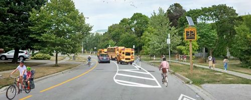 Artist rendering of Option 1: One-way street on Chartland Boulevard South between Dibgate Boulevard and Briarscross Boulevard. People cycling can travel in both directions.