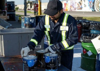 City staff collecting paint for safe disposal at a Community Environment Day.