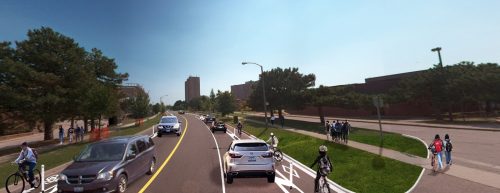 Artist rendering of Option 2 (in front of schools only) - cycle track with flex posts to allow for on-street school drop-off/pick-up and limited parking