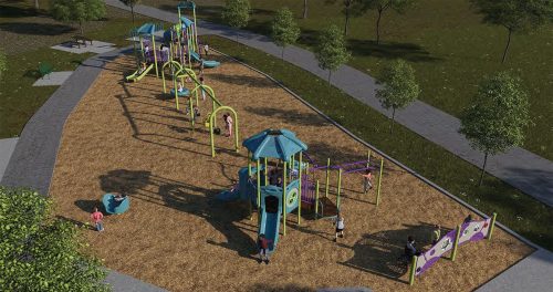 An aerial view of Playground Design C from the top to the bottom, featuring a large senior play structure, triple-bay swing set, junior play structure, sit-down spinner, and free-standing sensory wall.