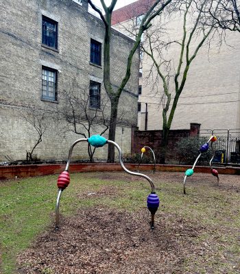 Bent chrome poles with colourful wooden beads