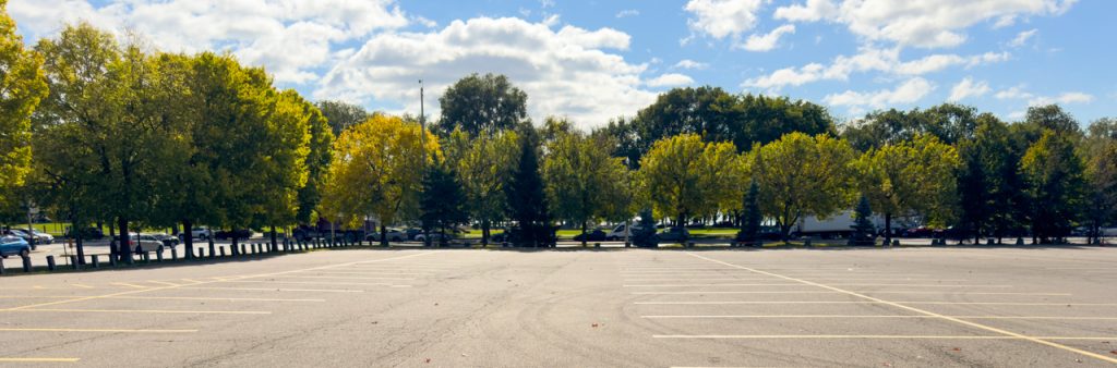 A image of the parking lot and parkland at Gore Park West