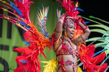 Performer on stage in Caribbean festival costume