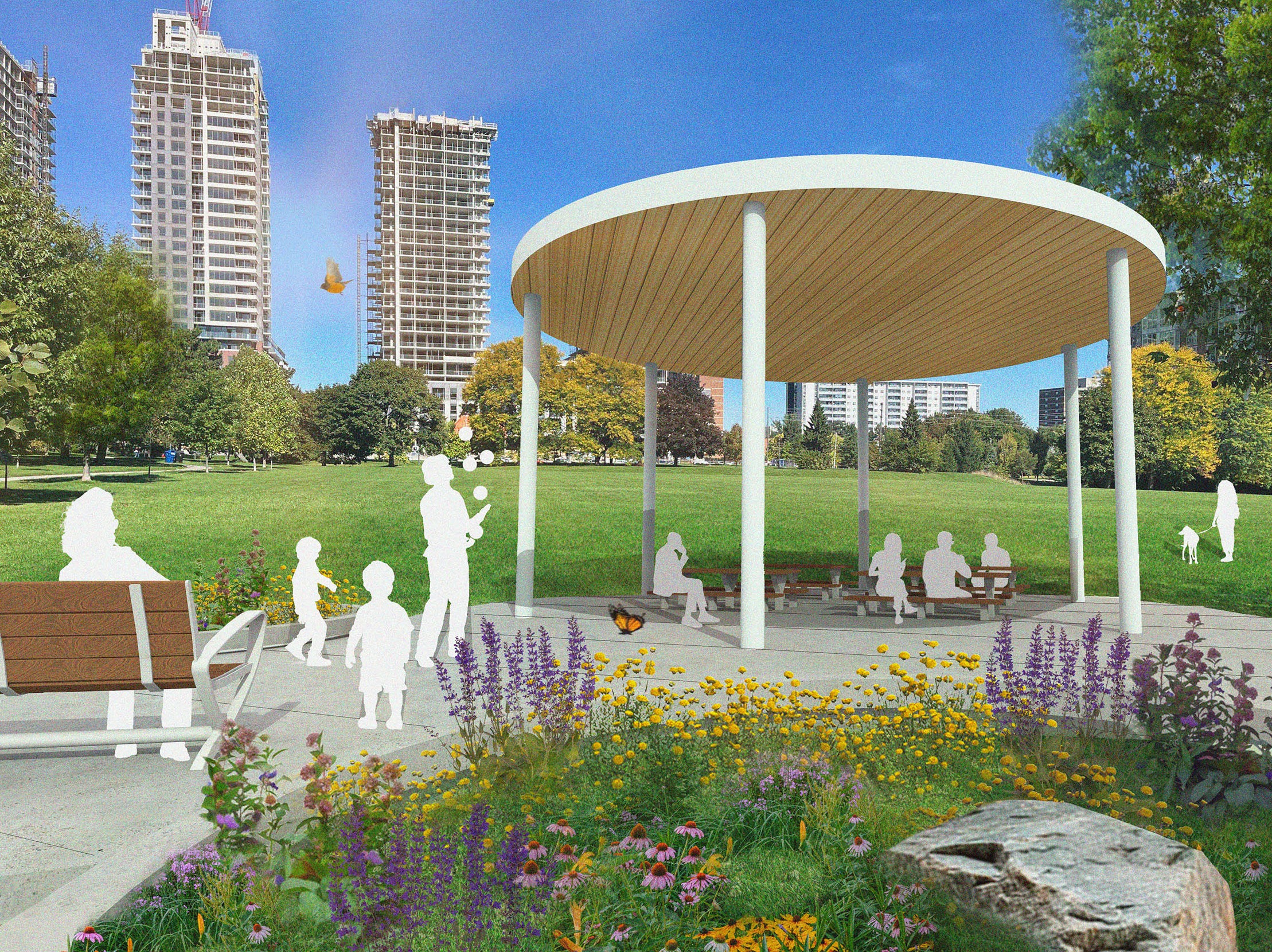 Rendering showing round shade pavilion with people seated at picnic tables underneath and perennial garden beds next to it. A pathway alongside the pavilion shows a park bench with a person seated on it. Two tall apartment buildings are in the background, with the open grass field in between.
