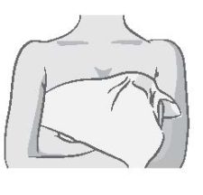 woman using wet warm towel to cover breast