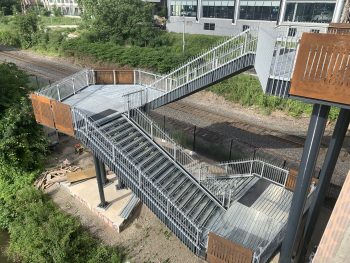 Zigzag stairs leading to path.
