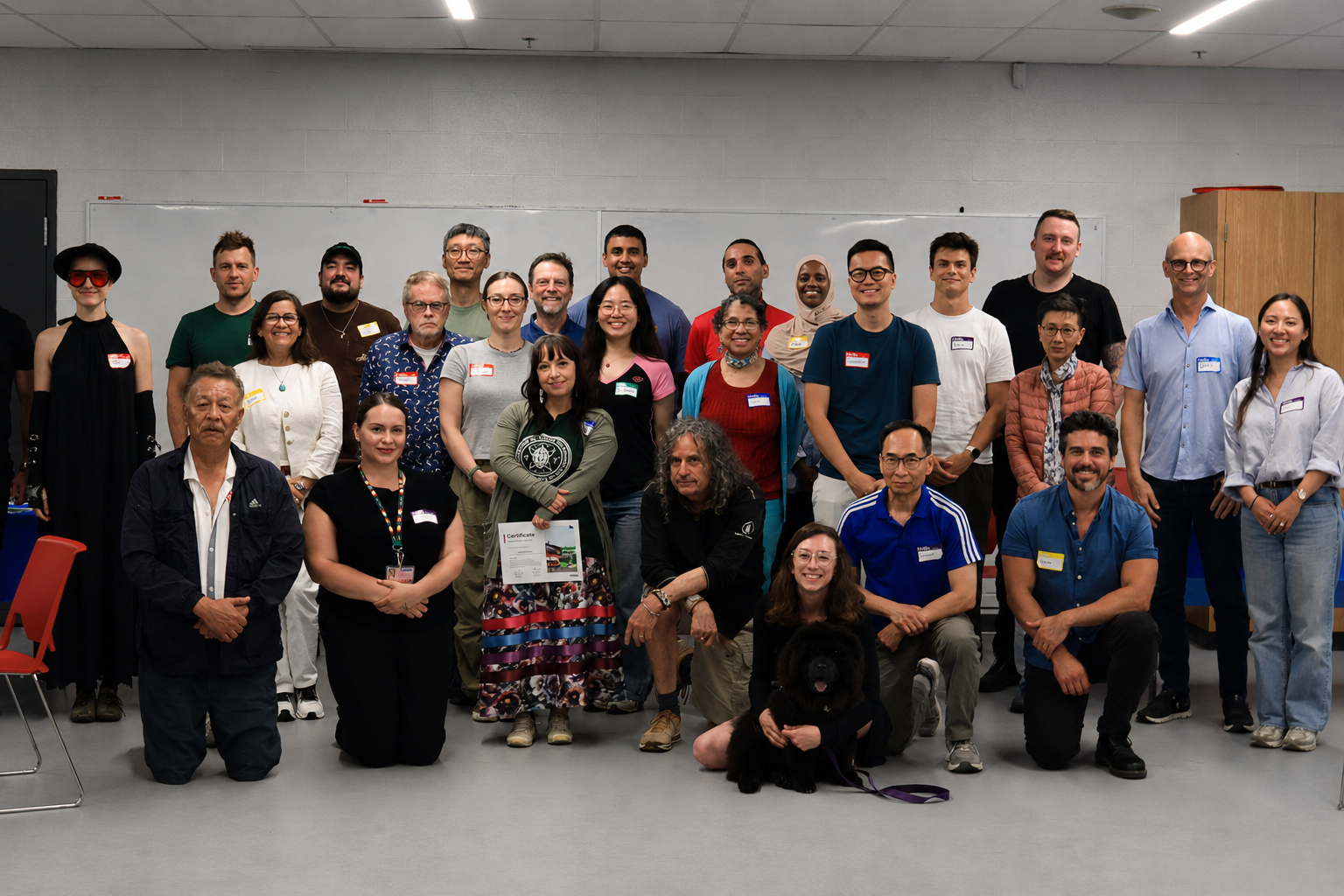 Group photo taken of Indigenous Advisory Circle, Community Advisory Committee members, and design consultants at the joint meeting on July 9, 2026 at Canoe Landing Community Recreation Centre