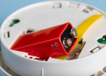 Red battery in smoke alarm.