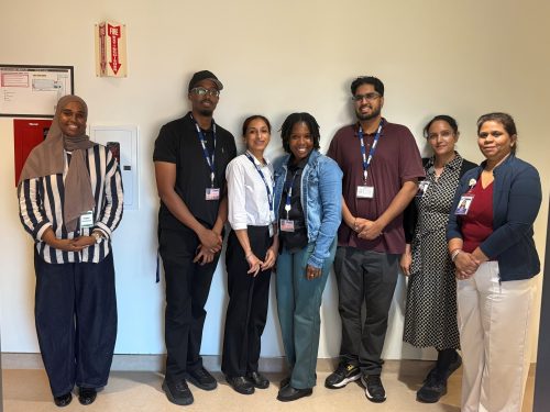 Kipling Acres hosts university students completing Public Health Inspector placements with the Control of Infectious Diseases and Infection Prevention & Control Program at Toronto Public Health. They stand for a group photo with Kipling Acres staff.