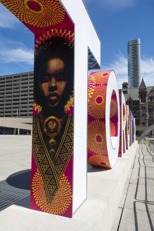 image of the Toronto Sign with the Patterns of the People wrap to mark the United Nations' International Decade for People of African Descent
