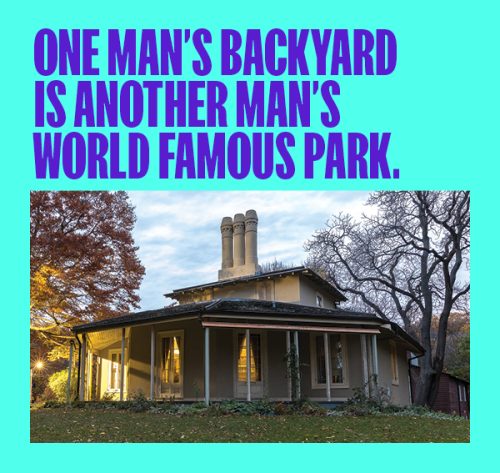 Text one man's backyard is another man's world famous park over image of Regency-era cottage, lawn and trees